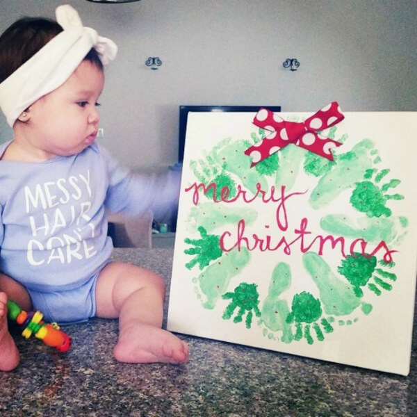 hand-and-footprint-wreath Hand And Foot Prints Wreath Craft Christmas Wreath Crafts For Kids