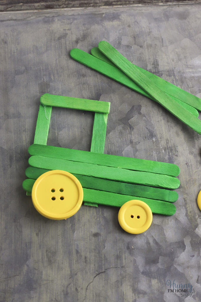 popsicle-stick-and-buttoned-toy-tractor Popsicle Stick And Buttoned Toy Tractor