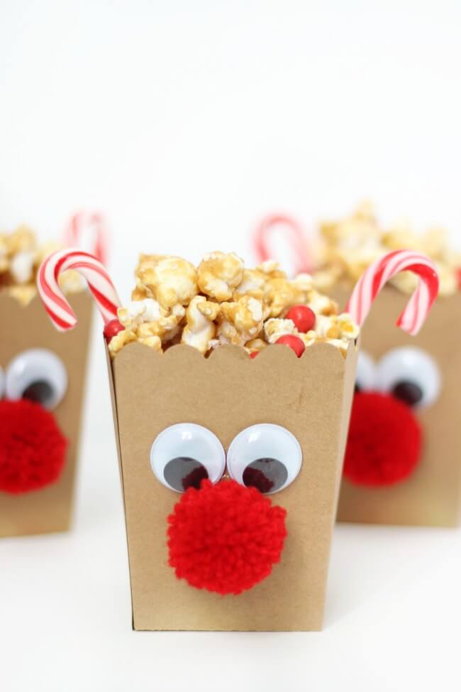 red-nosed-popcorn-box-craft-using-pom-poms-and-candy-cane Red-Nosed Popcorn Box Craft Using Pom Poms & Candy Cane