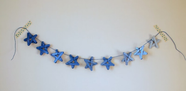 sparkly-popsicle-stick-star-garland-craft Sparkly Popsicle Stick Star Garland Craft