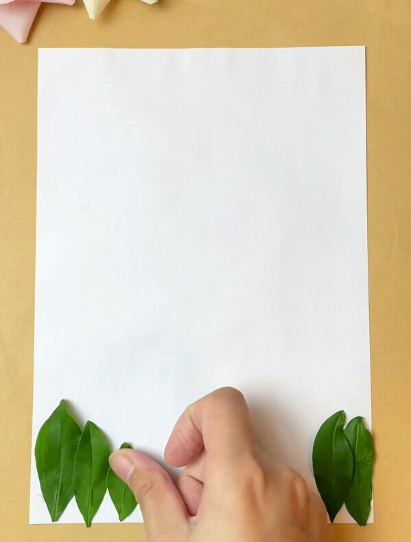Sticking Green Leaves- Teach Yourself How To Make a Dinosaur Animal Craft Out of Leaves