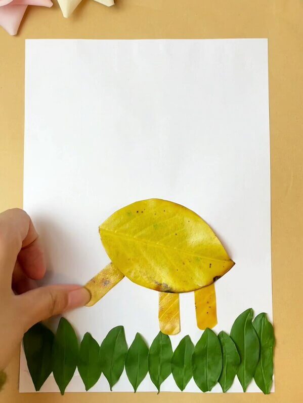 Legs of the Dinosaur- A Step-By-Step Guide on Crafting a Dinosaur Animal Out of Leaves for Children
