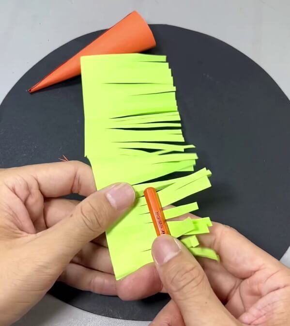 Rolling Ends Of Fringe - Tutorial for Constructing a Paper Carrot