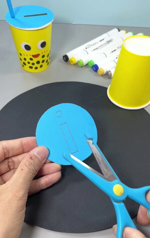 Cutting A Rectangle and Circle From Circle - Put together your own recycling craft with this straightforward activity.