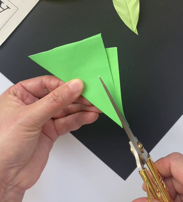 A step-by-step guide to teaching kids to fold a paper leaf Learn how to craft a leaf from paper with this tutorial for kids