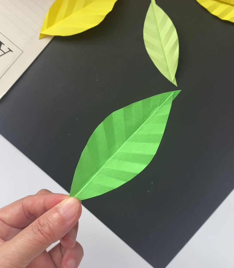 This Is The Final Look Of Our Folded Paper Leaf Craft! An instructional manual on producing a paper leaf for kids