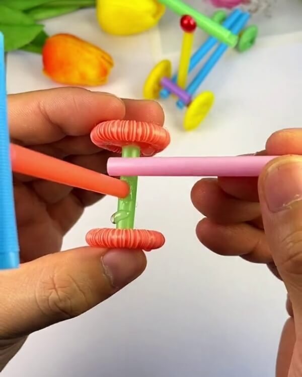 More Parts To Attach- How to make a scooter for kids with plastic straws a how-to guide
