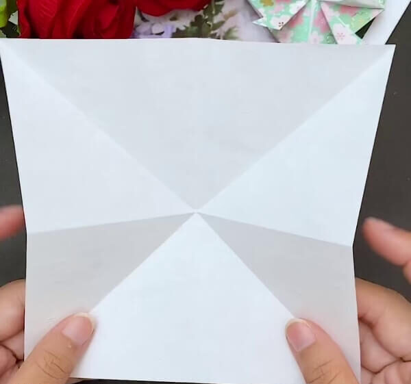 Make Some Fold Marks On The Sheet- Learning to produce a heart-shaped paper envelope through origami