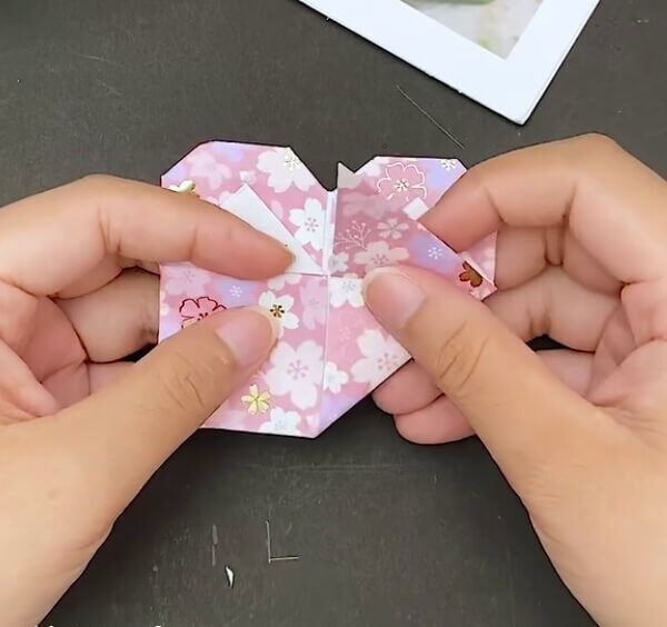 Fold The Bottom Section Back- Follow this comprehensive step-by-step tutorial to make an Origami Heart Envelope.