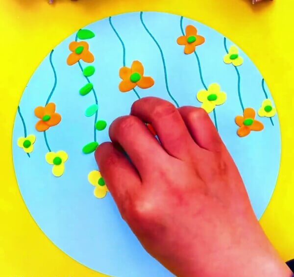 Make Leaves With Dark And Light Green Modelling Clay-Guide kids in the production of clay butterflies and petals